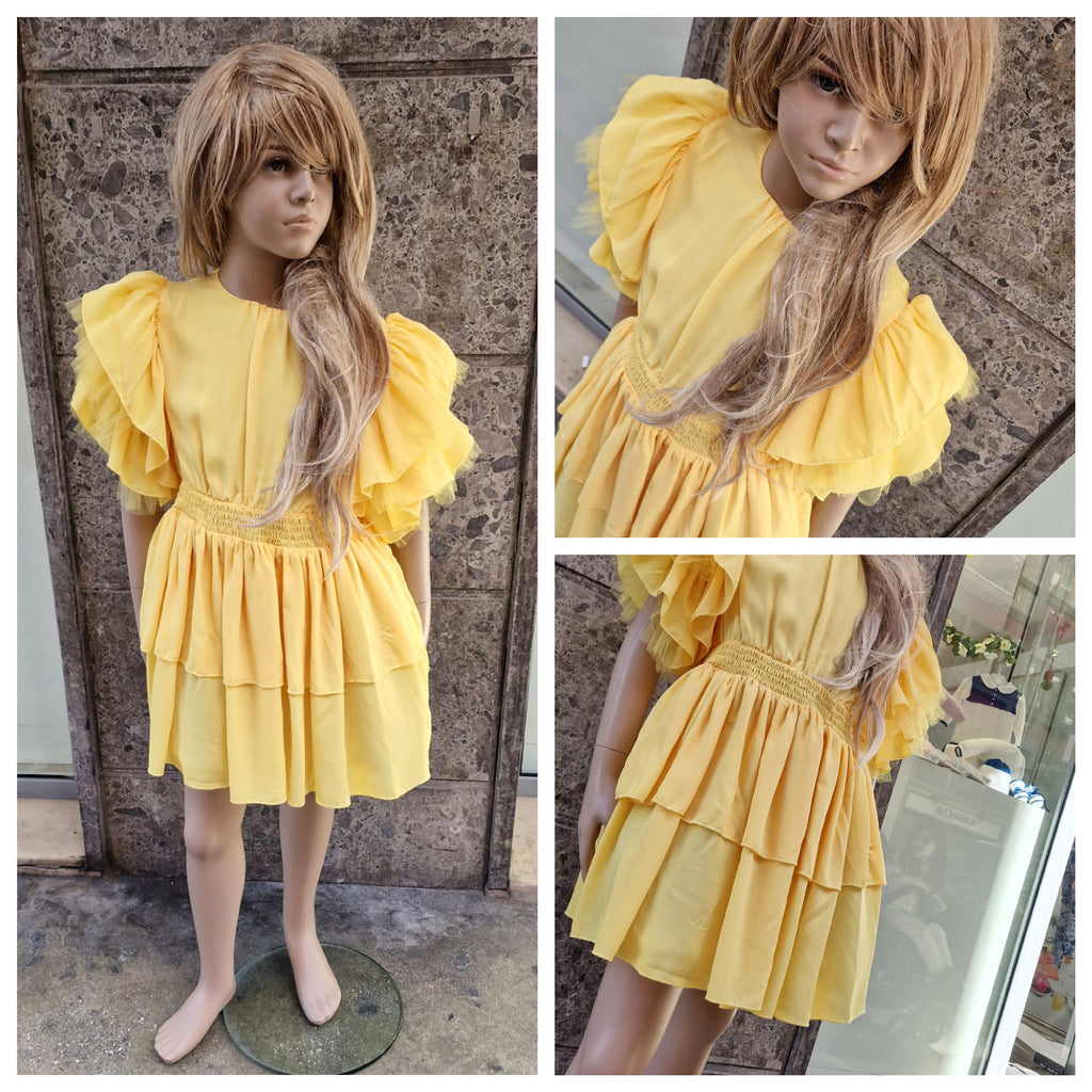 Vestito bambina in tessuto giallo con maniche in tulle